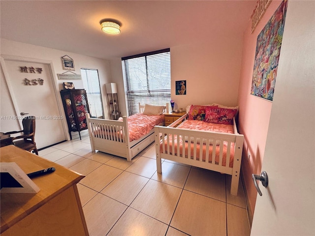 3007 NE 183rd Ln Unit 7, Aventura, FL 33160 - bedroom featuring light tile patterned floors