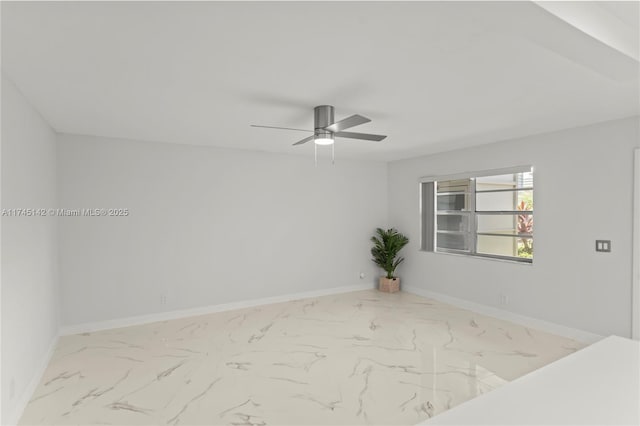 unfurnished room with ceiling fan