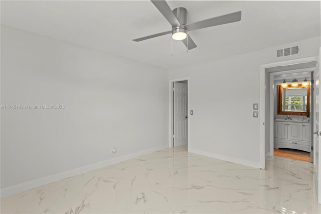 spare room featuring ceiling fan