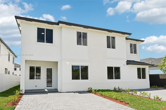 back of house with a patio area