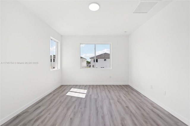 empty room featuring light hardwood / wood-style floors