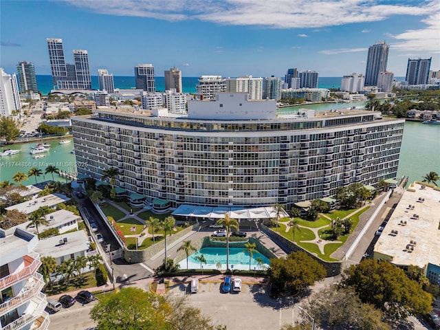 birds eye view of property featuring a water view