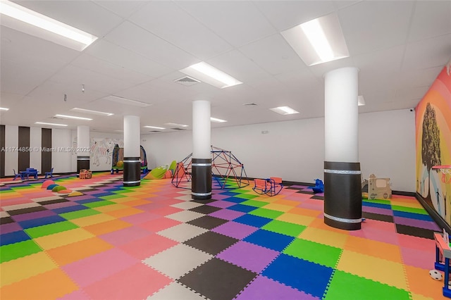 playroom with a drop ceiling