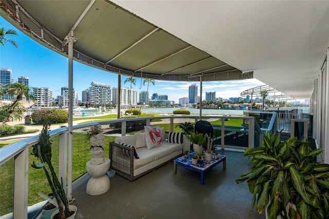 view of patio / terrace with an outdoor hangout area and a balcony