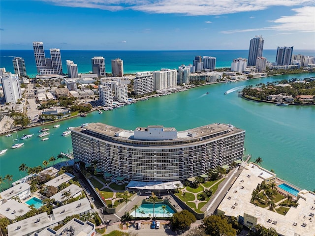 birds eye view of property with a water view