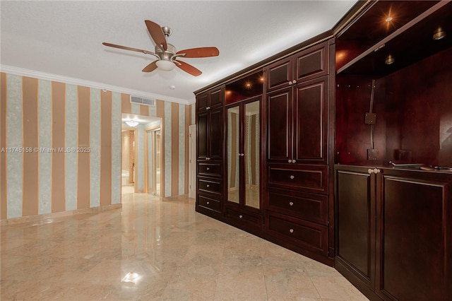 interior space featuring marble finish floor, visible vents, and a ceiling fan