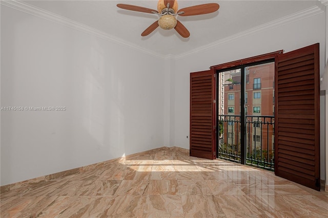 empty room featuring ceiling fan, marble finish floor, and ornamental molding