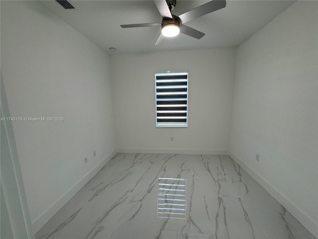 spare room featuring ceiling fan