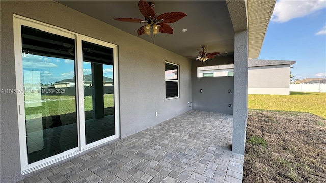 view of patio / terrace featuring ceiling fan