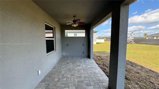 view of patio / terrace featuring ceiling fan