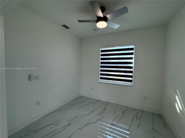 empty room featuring ceiling fan