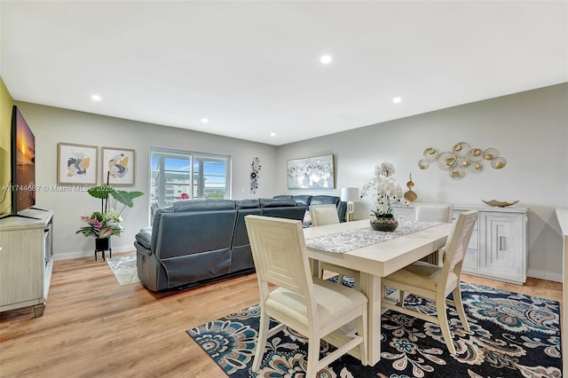 dining room with light hardwood / wood-style flooring