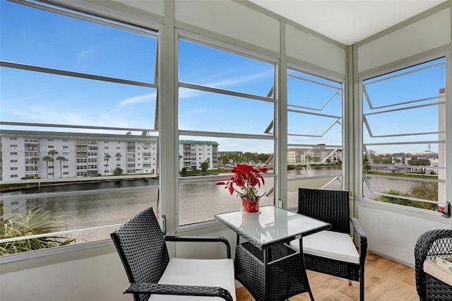 sunroom with a water view