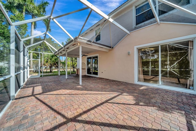 exterior space featuring ceiling fan