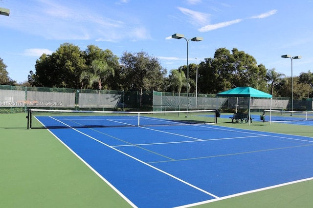 view of sport court with fence and community basketball court