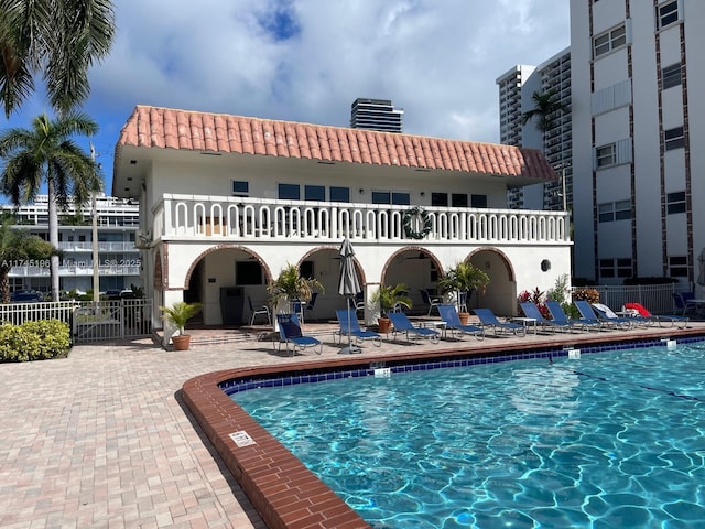 3181 S Ocean Dr Unit 107, Hallandale Beach, FL 33009 - community pool featuring a patio