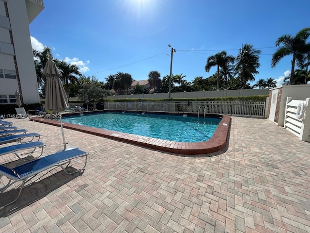 3181 S Ocean Dr Unit 107, Hallandale Beach, FL 33009 - community pool featuring a patio area
