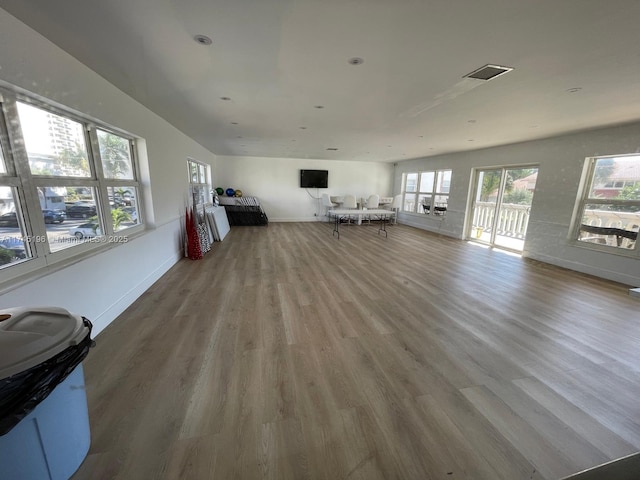 3181 S Ocean Dr Unit 107, Hallandale Beach, FL 33009 - living room with healthy amount of natural light and wood finished floors
