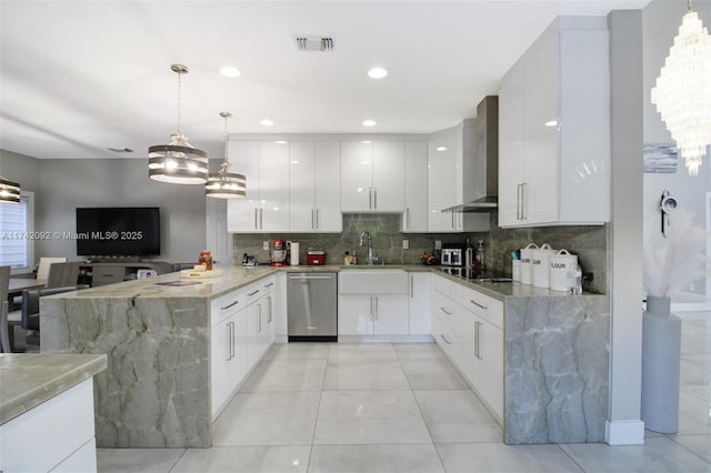 kitchen with wall chimney exhaust hood, decorative light fixtures, kitchen peninsula, and dishwasher