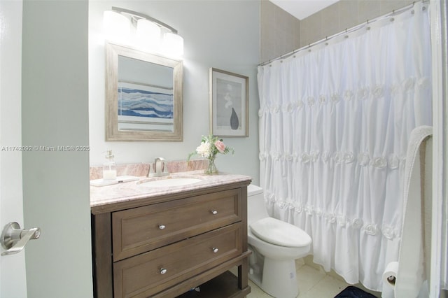 bathroom featuring vanity, toilet, and curtained shower