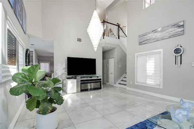 living room featuring light tile patterned floors and mail boxes