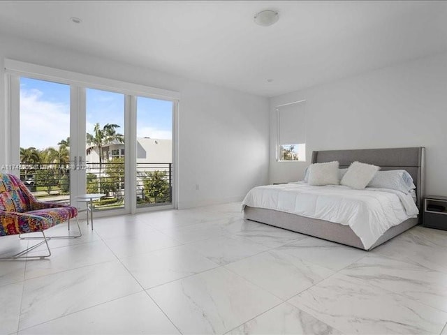 bedroom with access to exterior and french doors