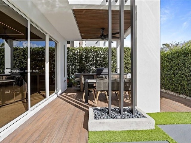 wooden terrace with ceiling fan