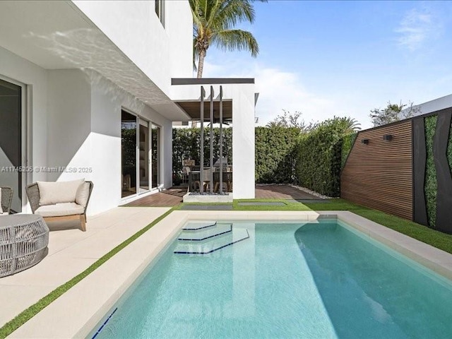 view of pool with a patio