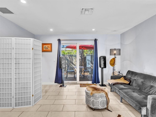 living room featuring light tile patterned floors