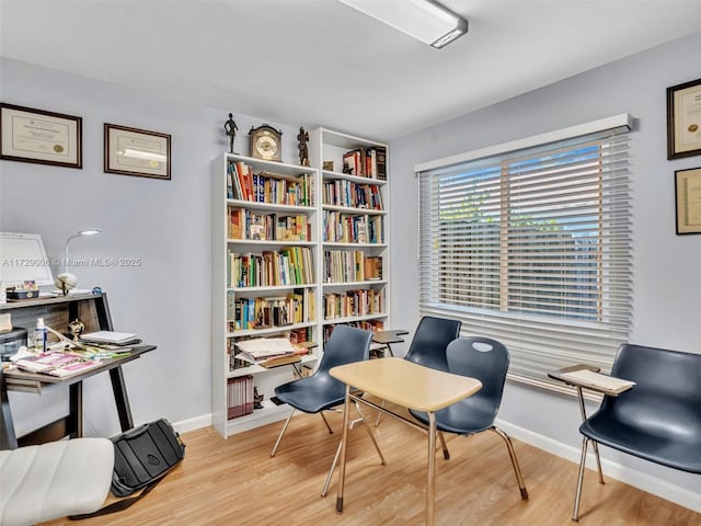 sitting room featuring light wood-type flooring