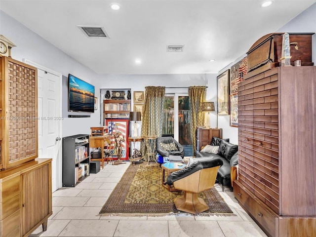 living room featuring light tile patterned flooring