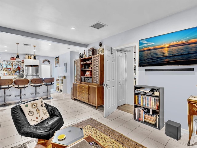 living room featuring indoor bar