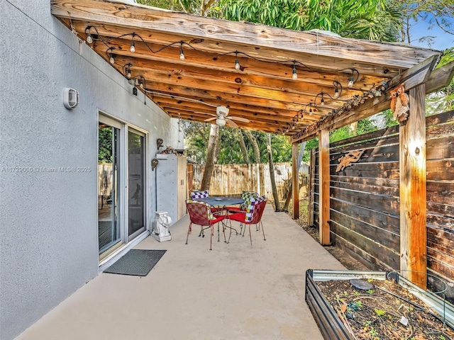 view of patio / terrace featuring ceiling fan