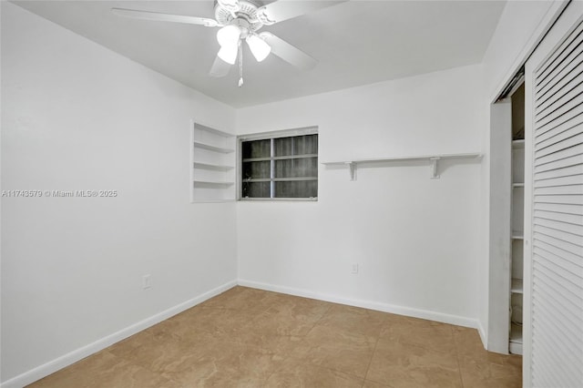 spacious closet featuring ceiling fan