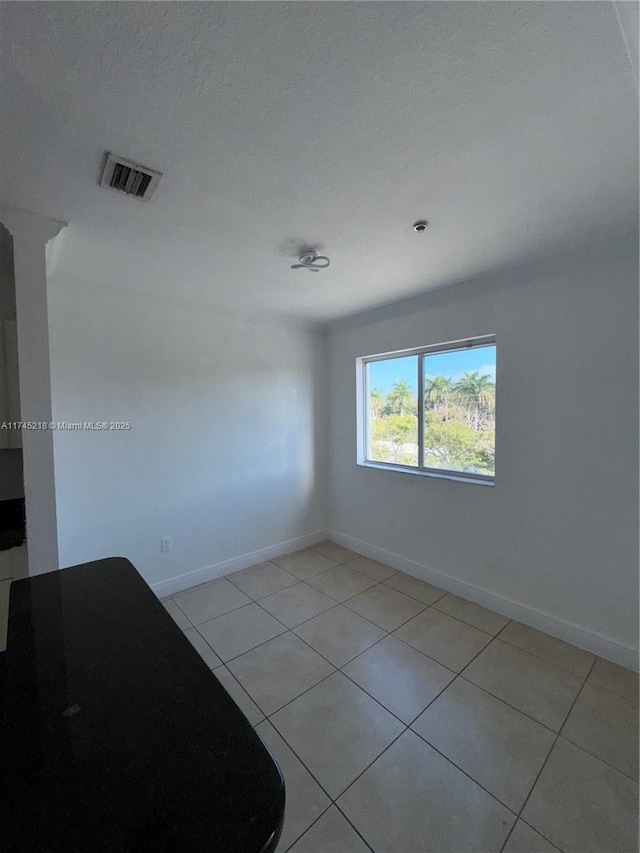 view of tiled empty room