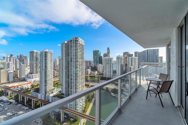 balcony featuring a water view