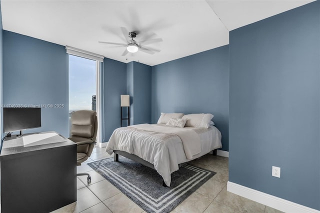 tiled bedroom with ceiling fan