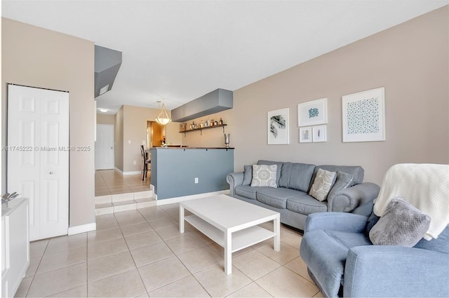 living room with light tile patterned floors