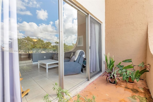 exterior space with light tile patterned floors