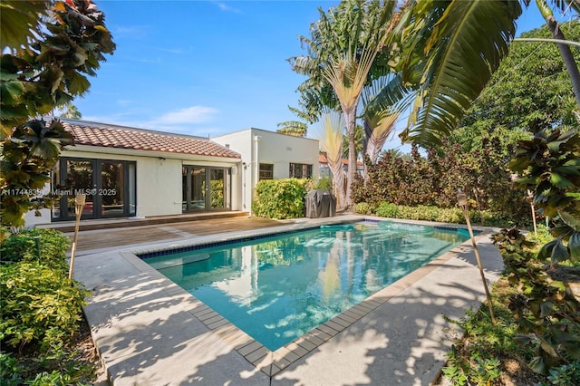 pool featuring french doors