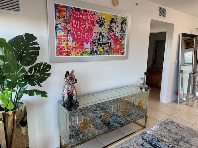 3530 SW 22nd St Unit 706, Miami, FL 33145 - hallway with light tile patterned floors, visible vents, and baseboards