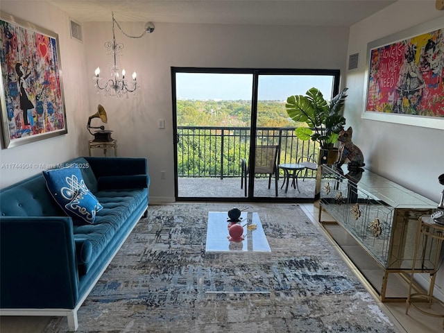 3530 SW 22nd St Unit 706, Miami, FL 33145 - living room with visible vents and a notable chandelier