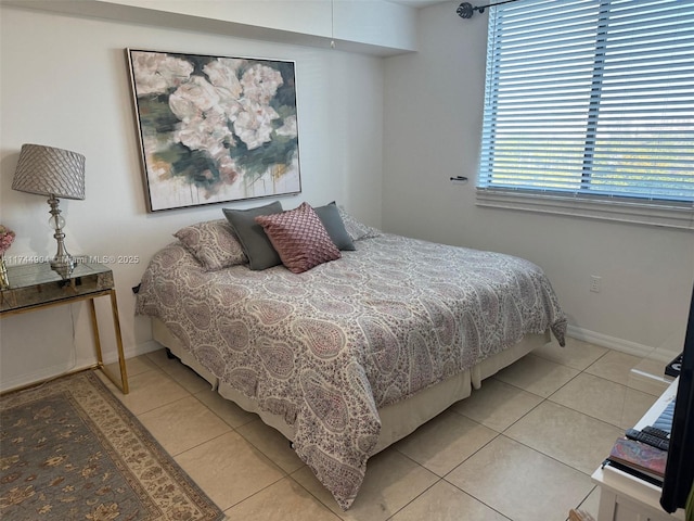 3530 SW 22nd St Unit 706, Miami, FL 33145 - bedroom featuring tile patterned flooring and baseboards
