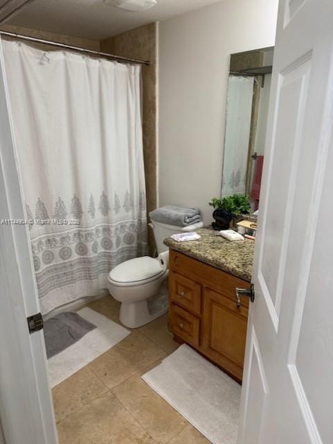 3530 SW 22nd St Unit 706, Miami, FL 33145 - bathroom with toilet, a shower with shower curtain, tile patterned flooring, and vanity