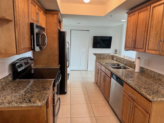 3530 SW 22nd St Unit 706, Miami, FL 33145 - kitchen featuring light tile patterned floors, brown cabinetry, appliances with stainless steel finishes, open shelves, and a sink