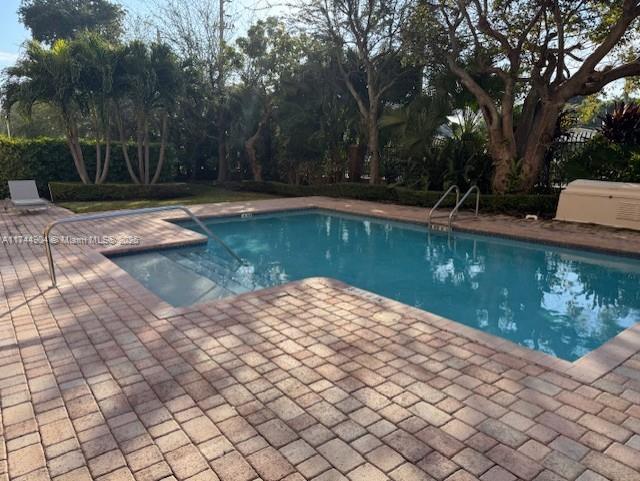 3530 SW 22nd St Unit 706, Miami, FL 33145 - pool featuring a patio