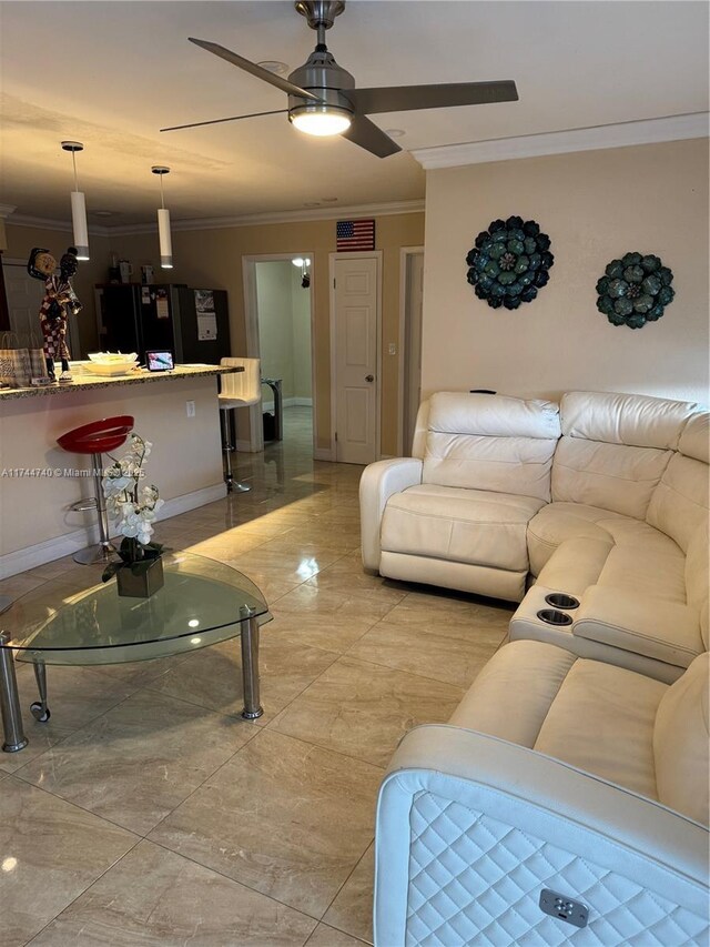 2770 NW 164th Ter, Miami Gardens, FL 33054 - living room featuring ceiling fan, marble finish floor, and ornamental molding
