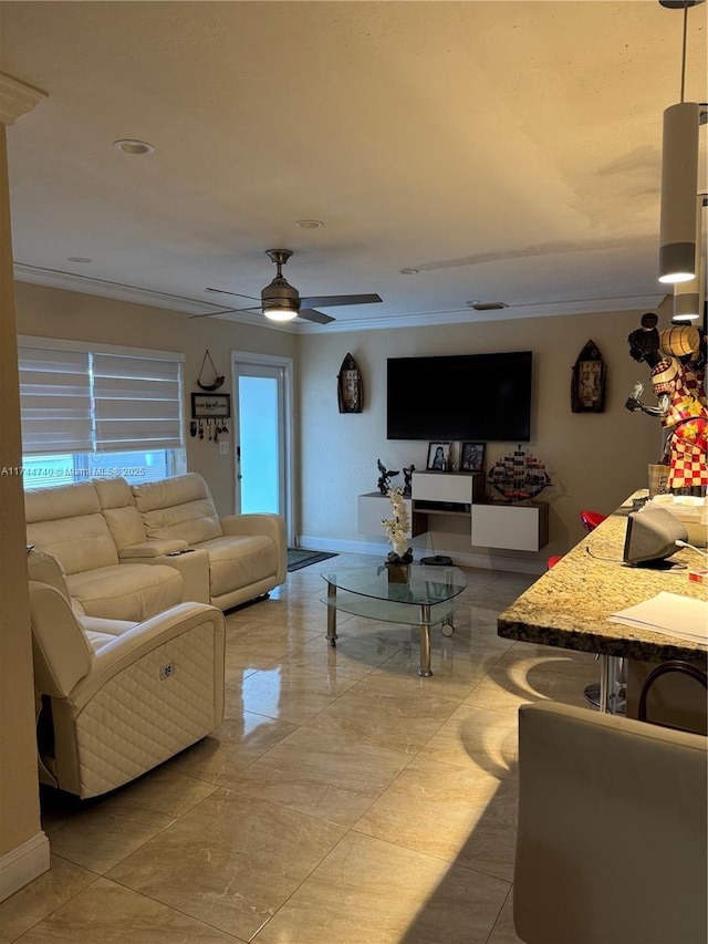 2770 NW 164th Ter, Miami Gardens, FL 33054 - living area featuring baseboards, ceiling fan, and ornamental molding