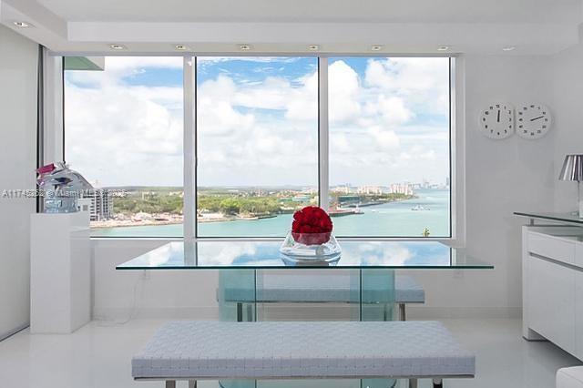 dining room featuring a water view