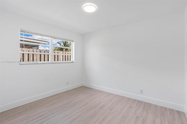 empty room with light wood-type flooring